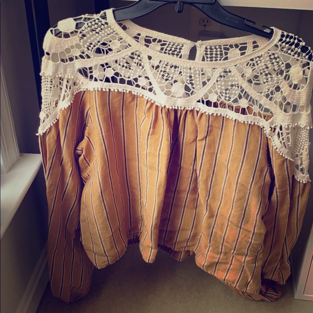 Yellow blouse with brown stripes